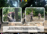 Personel Batalyon C Pelopor Satbrimob Polda Sultra Laksanakan Pembenahan Jembatan di Desa Batu Ganda