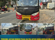 Personel Satuan Brimob Polda Sultra Antar Siswa Sekolah Melalui Program Bus Brimob Gratis