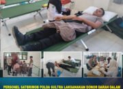 Personel Satbrimob Polda Sultra Laksanakan Donor Darah dalam Rangka HUT ke-64 SMA Negeri 1 Kendari