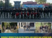WADANSAT BRIMOB POLDA SULTRA PIMPIN LONG MARCH DAN LATIHAN KLBM DI DESA POUSU JAYA